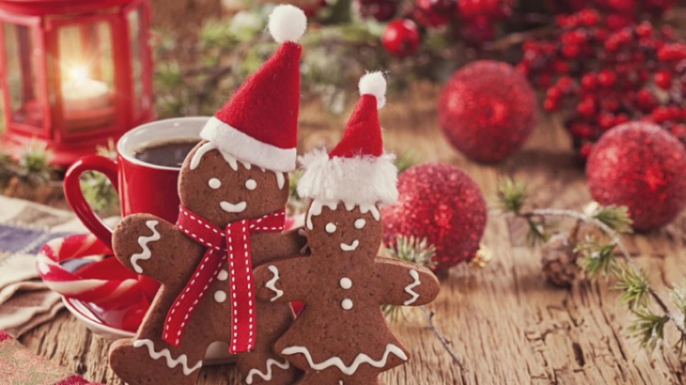 Gingerbread Man & Woman With Santa Hats Reflecting Festive Classroom Activities For EYFS, KS1 & KS2 Pupils